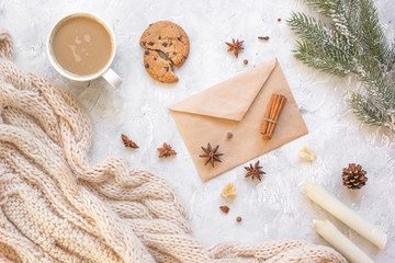 Christmas evening with cup of cocoa white background top view