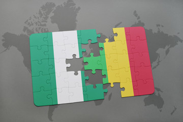 puzzle with the national flag of nigeria and mali on a world map