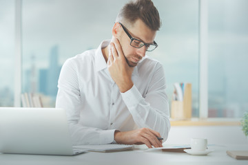 Handsome guy working on project