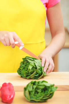 Woman preparing fresh vegetables food salad