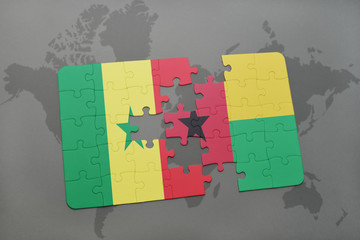 puzzle with the national flag of senegal and guinea bissau on a world map