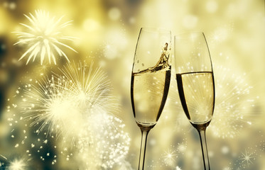 champagne glasses against holiday lights