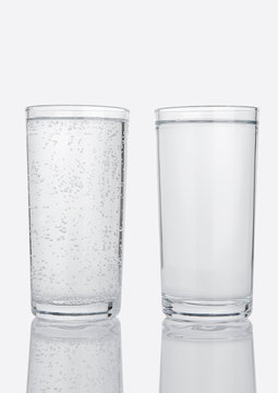 Two glasses with sparkling and still healthy water