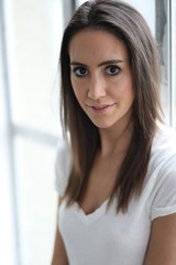 Beautiful Young Woman with Brown Hair and Eyes