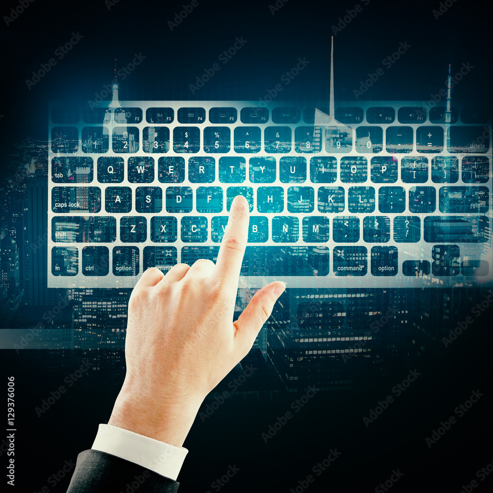 Poster hand with keyboard on city background
