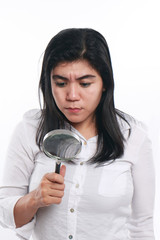 Asian Woman With Magnifying Glass