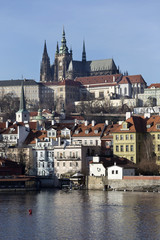 View on the winter Prague gothic Castle above River Vltava, Czech Republic