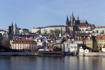 Obraz premium View on the winter Prague gothic Castle above River Vltava, Czech Republic