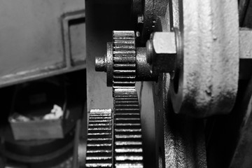 Gear of Obsolete Lathe. Black-and-white photo.