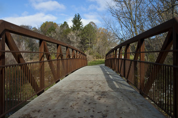 Iron and concrete bridge over the creek