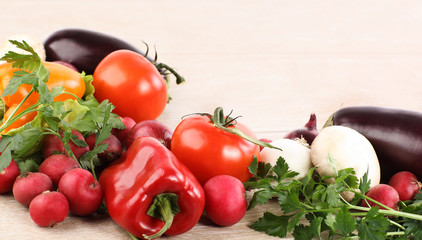 fresh vegetables - tomatoes,peppers, onions,mushrooms on wooden background