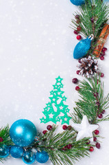 Christmas decoration pine branches cones Christmas balls paper Christmas trees white background