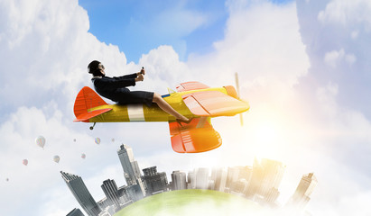 Woman in drawn airplane . Mixed media