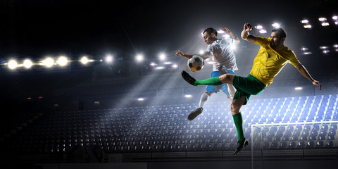 Soccer palyers fighting for ball . Mixed media