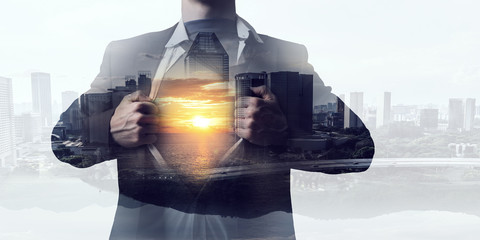 Exposure of businessman and modern city . Mixed media