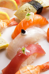 various type of nigiri sushi on white plate