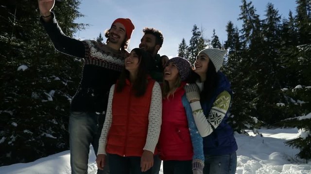 Man Hold Smart Phone Camera Taking Selfie Photo Friends Snow Forest Young People Group Outdoor Winter Pine Woods Slow Motion 120