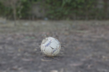 old football on the ground.