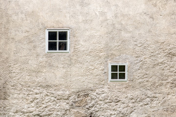 facade of an old building with small windows