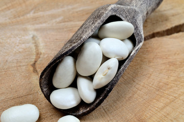 Fototapeta na wymiar beans in scoop on table
