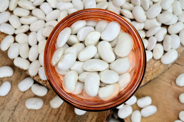 Fototapeta na wymiar white beans in jar on table