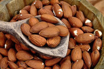 almond in bucket on table