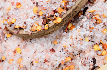 pink salt with chili seed on table