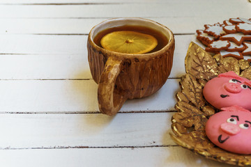 light breakfast with tea and homemade cookies  on wooden background