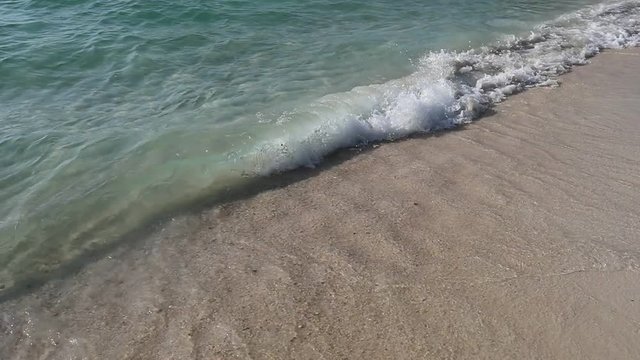 wave beats on the pure sand beach - Slow Motion