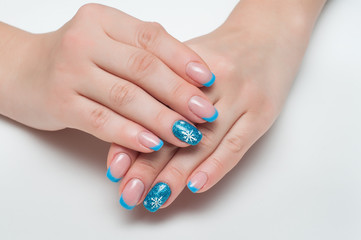 Christmas blue french manicure with white snowflakes 
