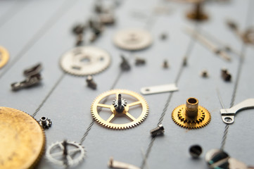 Detail of watch machinery on the table.