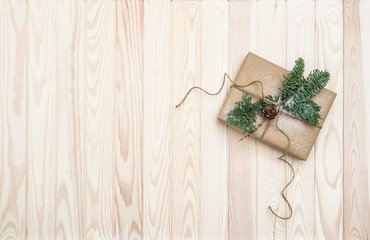 Christmas decoration wrapped gift pine tree branches