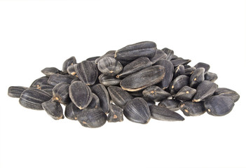 Sunflower seeds isolated on white background, close up