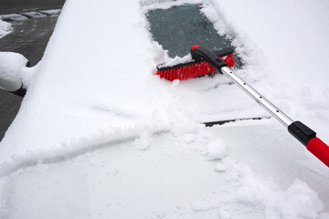 removing snow on the car