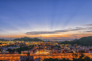 Industrial area of oil refinery at sunset