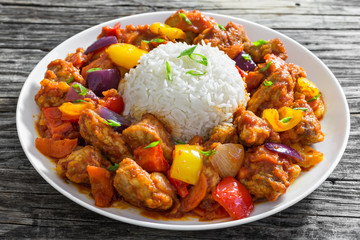 rice with Sweet and Sour fried pork chunks with vegetables