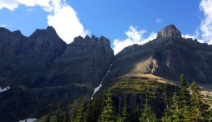 The rocky cliffs surrounding Iceberg Lake in Glacier National Park