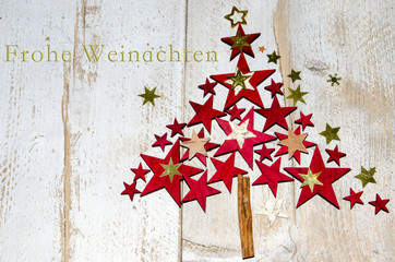 Christmas tree with stars on old blue wooden board :)