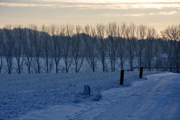 snow on the road in Belgium landscape