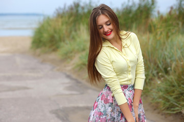 Fototapeta na wymiar girl with summer dress outdoors on a summer day