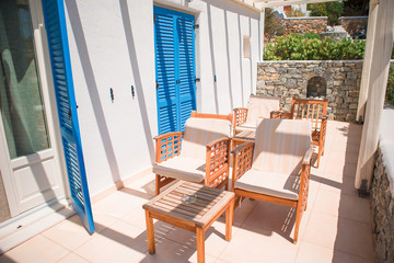 Beautiful terrace in luxury hotel. White architecture on greek island, Greece. Summer holidays