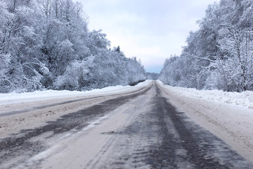landscape Road in the winter forest with snow covered