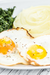 Wooden table with Mashed Potatoes (selective focus)