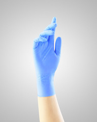 blue medical gloves textured on the fingers