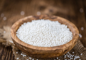 Tapioca on wooden background (selective focus)