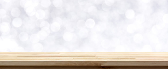 Wood table top on  abstract white bokeh background