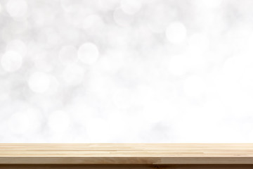 Wood table top on  abstract white bokeh background