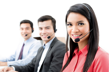 Smiling call center (or telemarketer) staff
