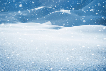 Winter snowy landscape with snowdrifts and snowstorm