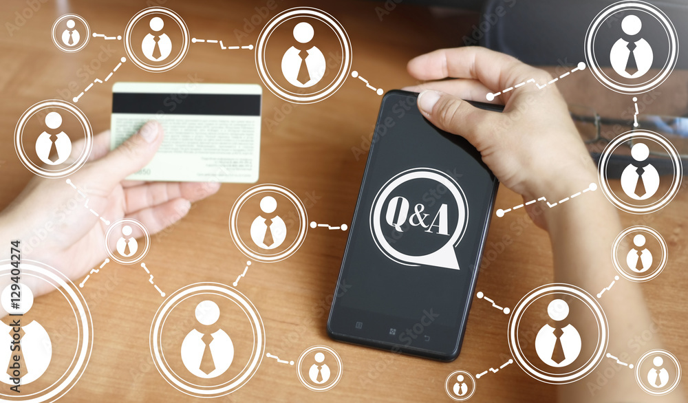 Poster hand keep a smart phone with q&a button. holding smartphone with sign question and answer. network b